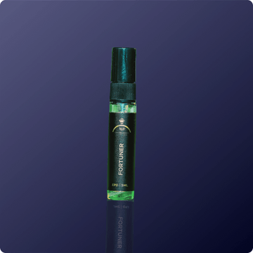 GreenFortuner perfume bottle on a dark blue background