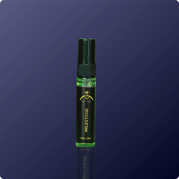 Milestone vape pen on a dark blue background