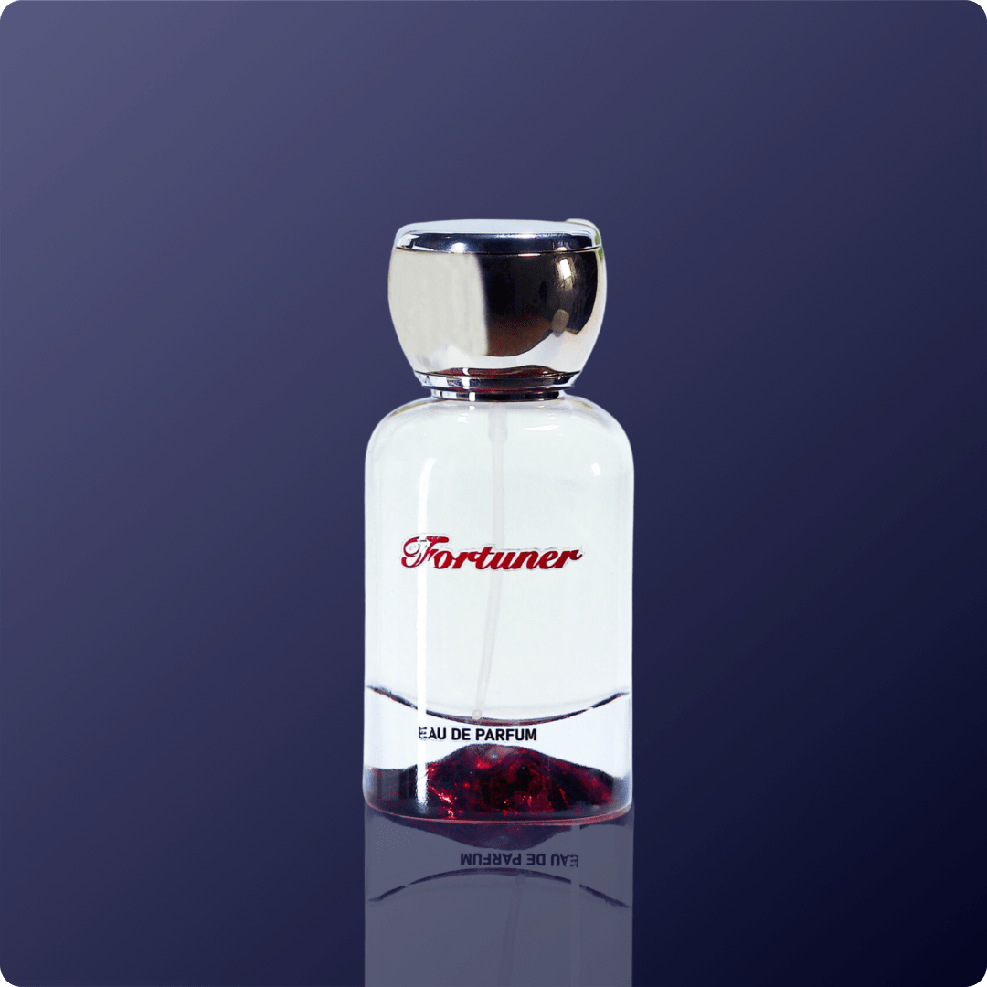 Perfume bottle labeled 'Fortuner' on a dark blue background