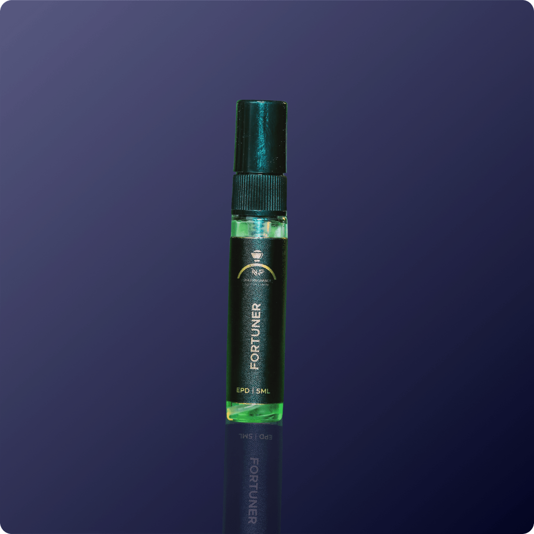 GreenFortuner perfume bottle on a dark blue background