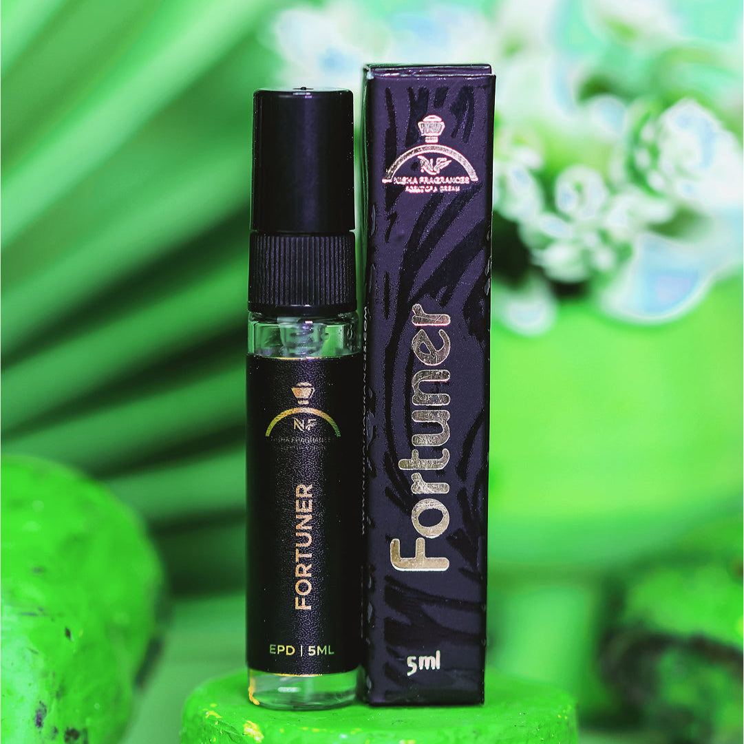 Milestone vape pen on a green pedestal with a green background and flowers.