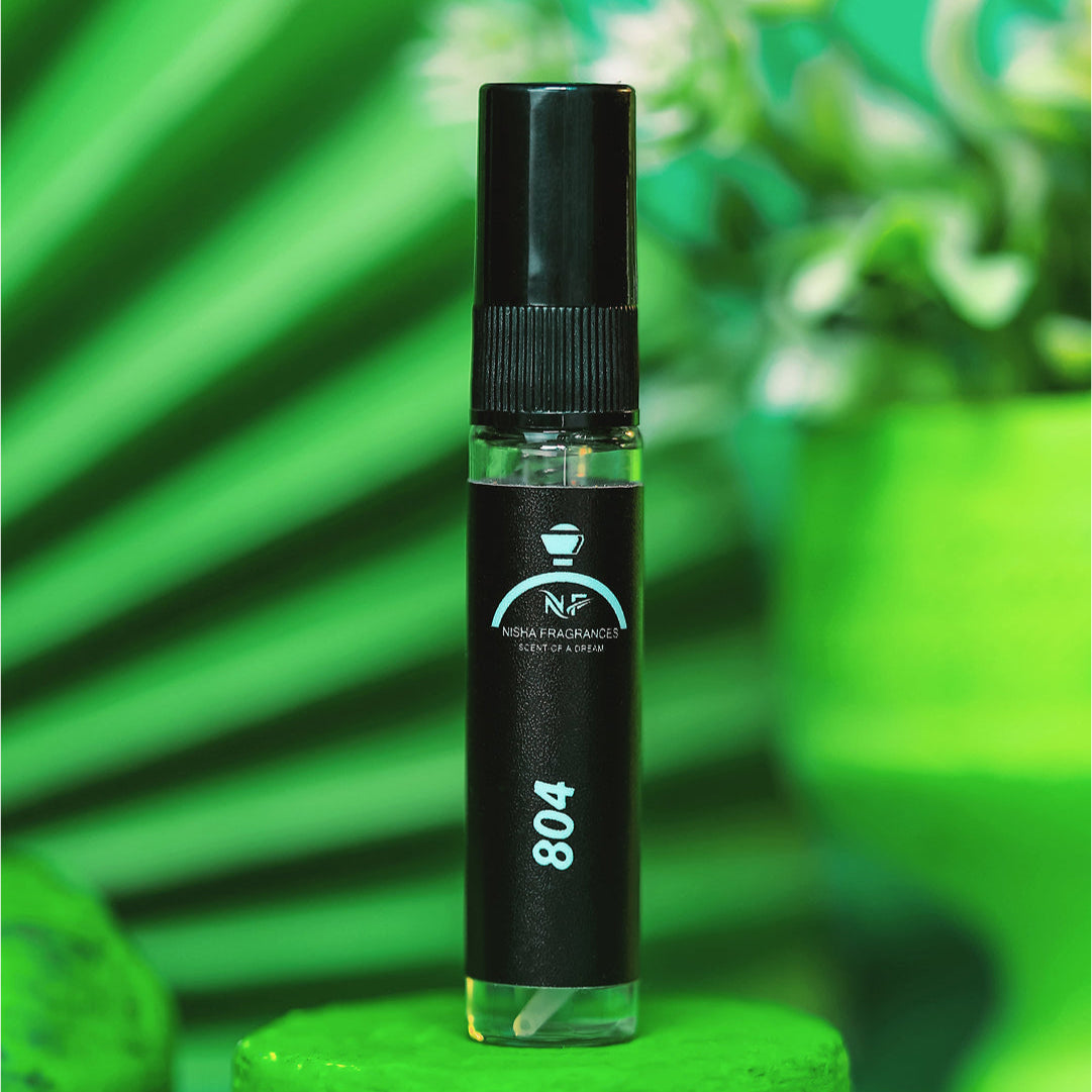 Black vape pen with visible branding on a green background