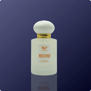 Perfume bottle labeled 'Milestone' on a dark blue background