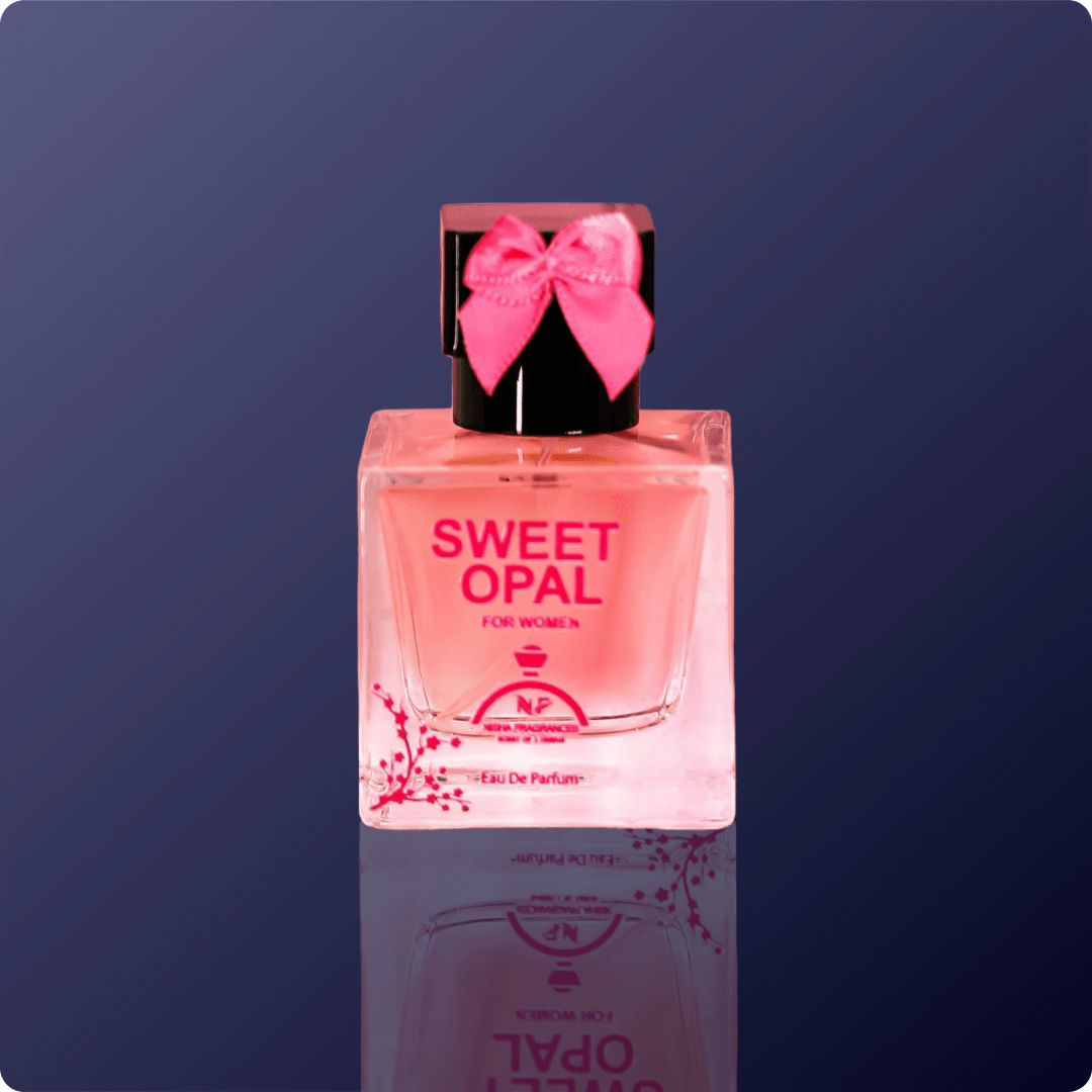 Perfume bottle labeled 'Sweet Opal' with a pink bow on a dark blue background